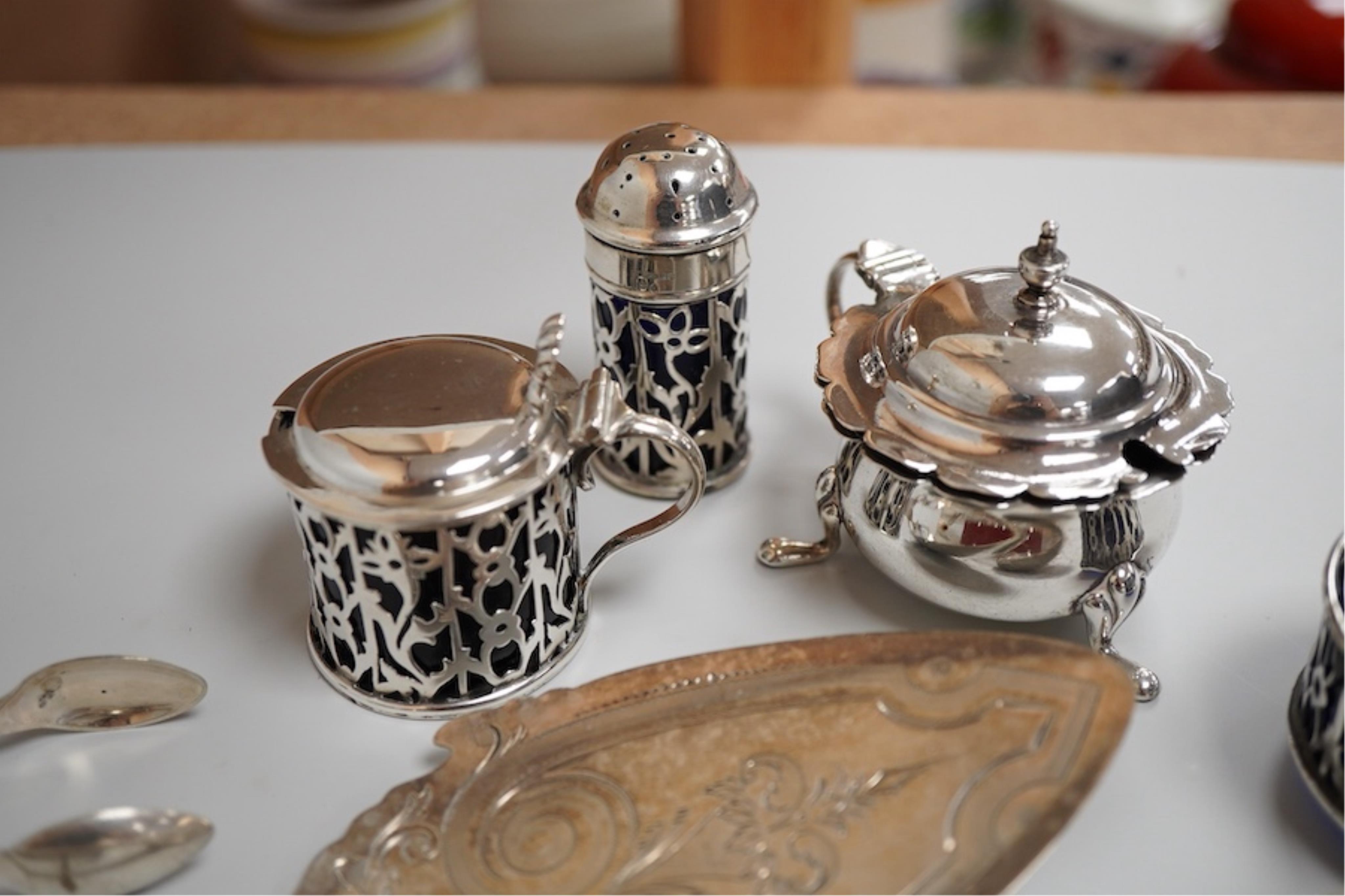 Two silver condiments and two sterling condiments, together with a set of six George V Old English and shell pattern coffee spoons by William Hutton & Sons Ltd, Sheffield, 1933, seven other items of assorted silver flatw